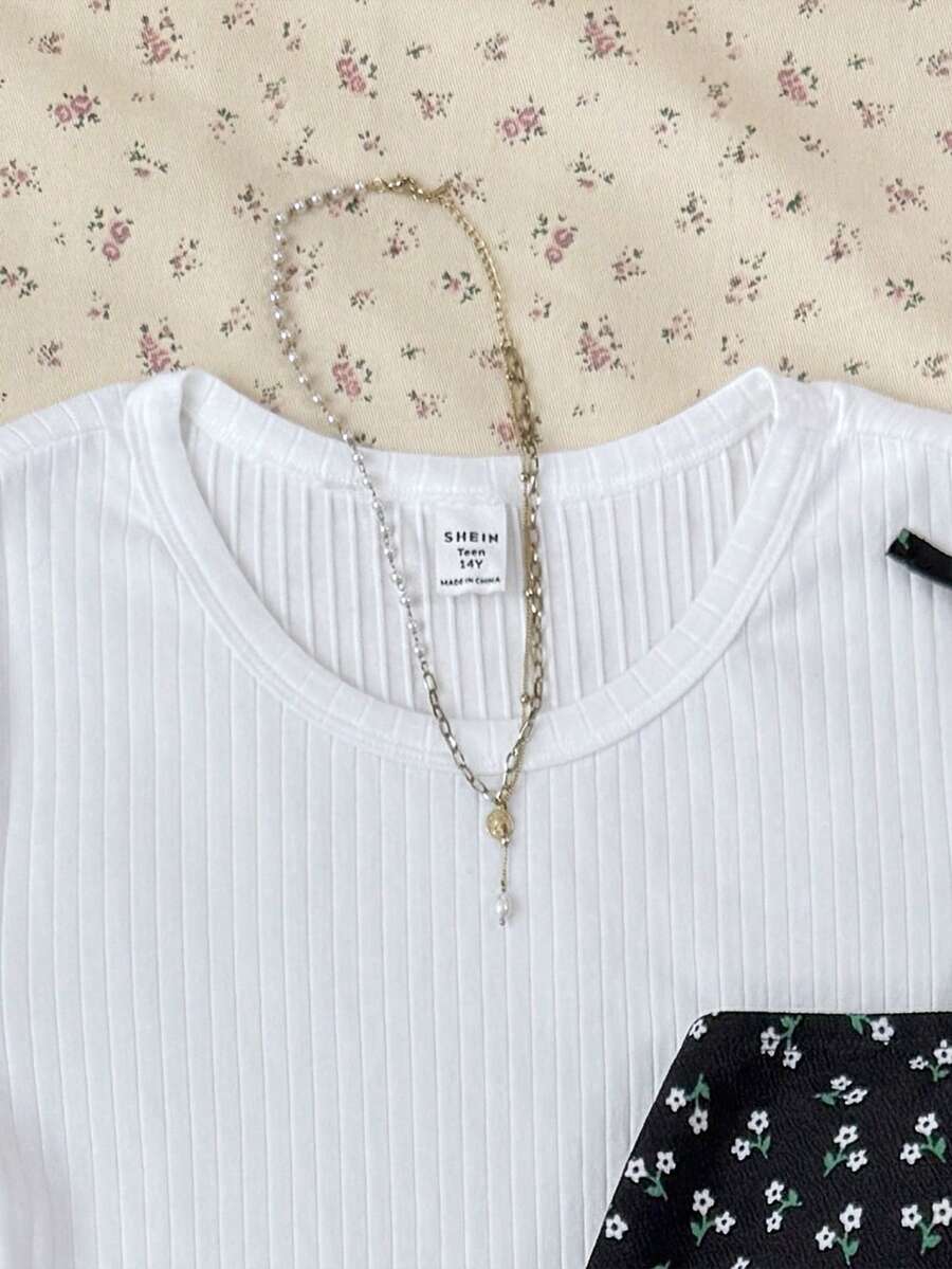 Tween girls' black and white ditsy floral plant print high waist flared camisole dress with a short sleeve t-shirt set.