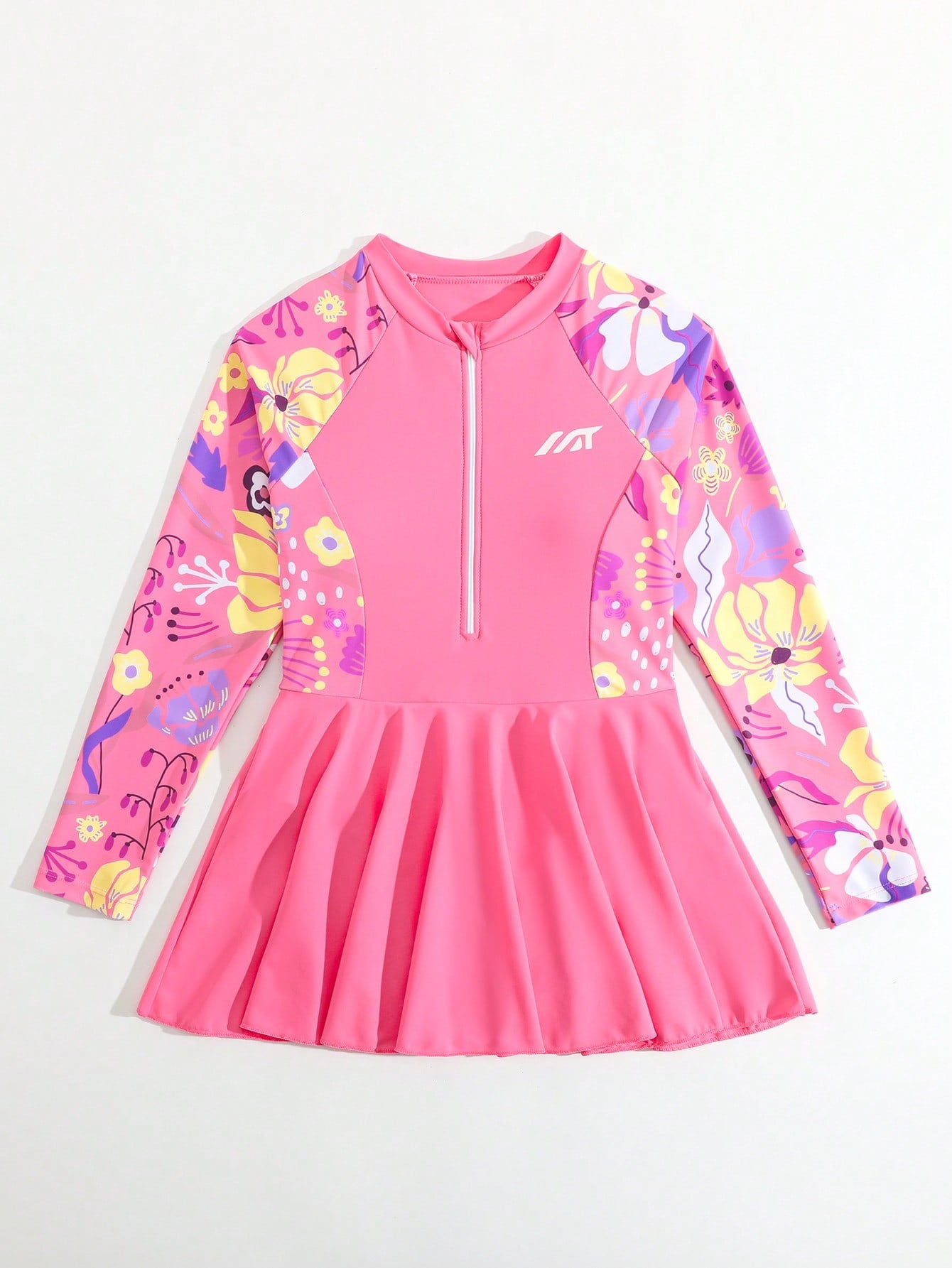 Tween girls one-piece swimsuit in black floral pattern with long sleeves, high neck, front zipper, and a skirt-style bottom.