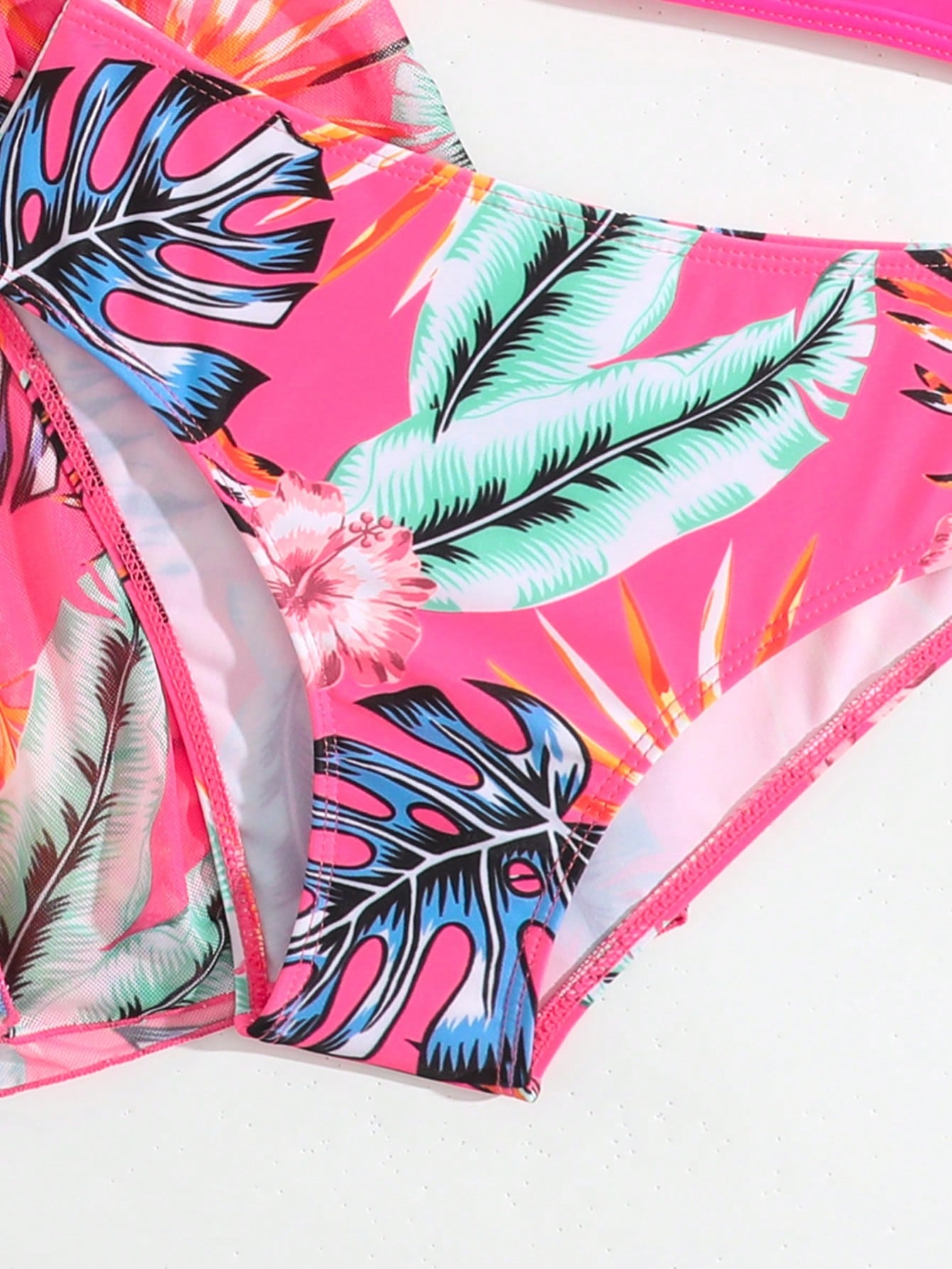 Tween girls 3-piece striped swimwear set featuring a tankini top, mid-waist bikini bottoms with a drawstring waist, and a matching kimono cover-up for beach or vacation wear.