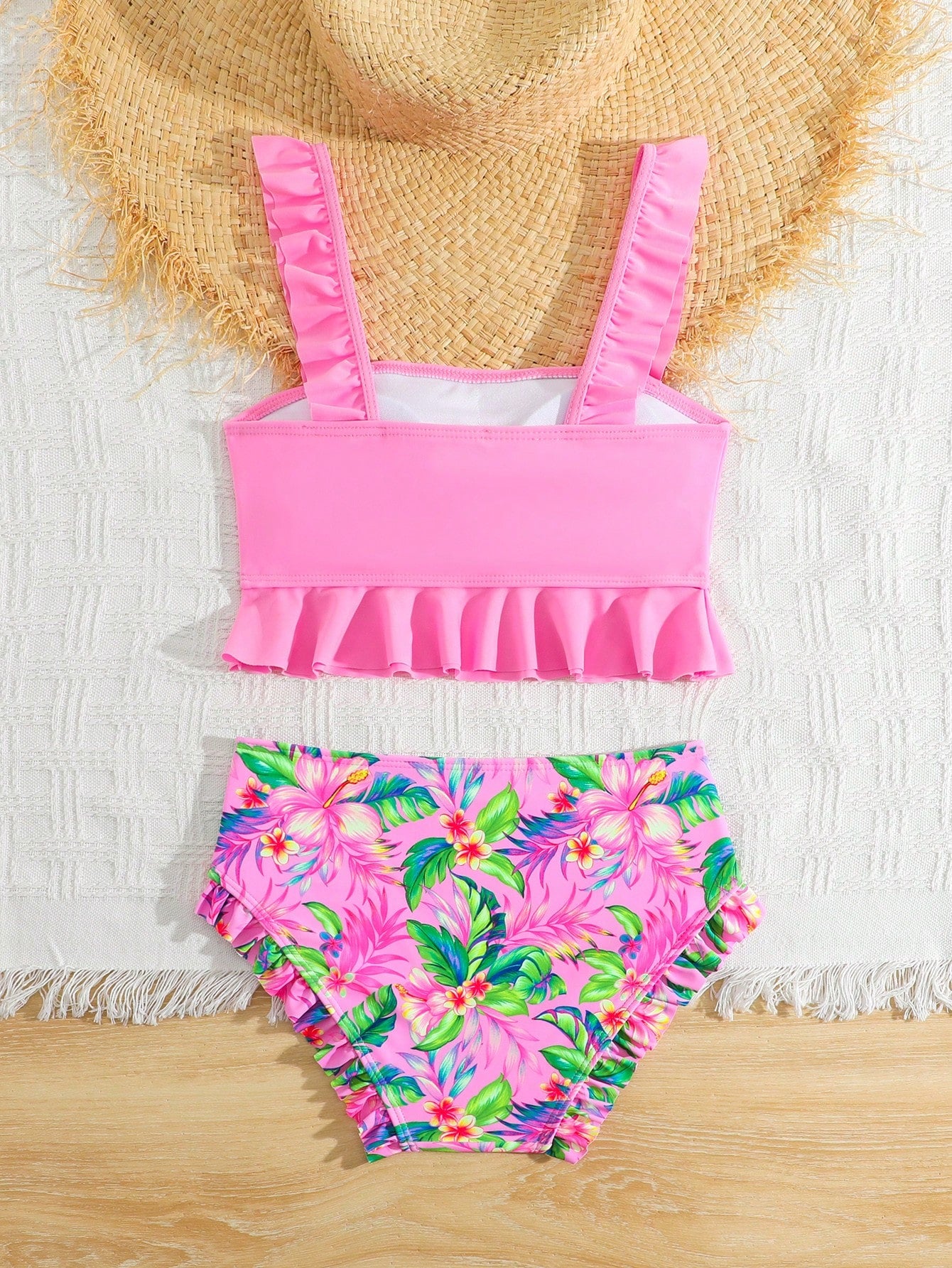 Tween girls solid color 2-piece bikini swimwear set with ruffle detail, strap neckline, wireless bikini top, and triangle mid-waist bikini bottoms; textured pattern with lined bottoms and high-stretch fabric, suitable for summer vacation.
