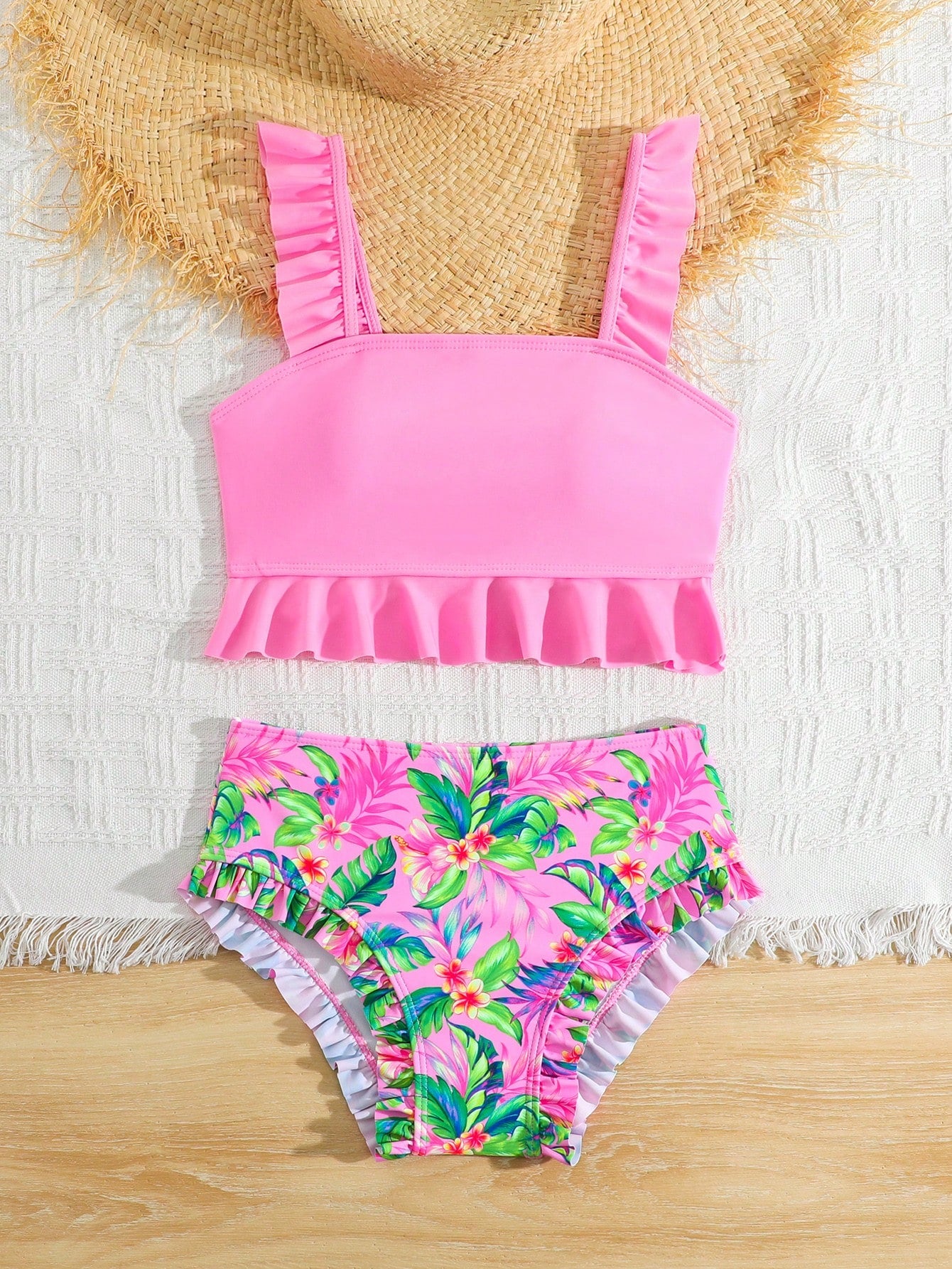 Tween girls solid color 2-piece bikini swimwear set with ruffle detail, strap neckline, wireless bikini top, and triangle mid-waist bikini bottoms; textured pattern with lined bottoms and high-stretch fabric, suitable for summer vacation.