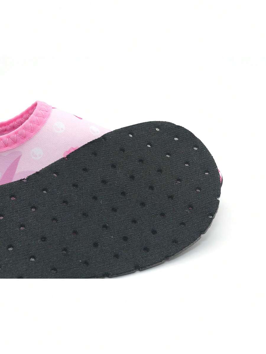 Boys breathable slip-on aqua water shoes featuring contrast binding and non-slip TPR soles for beach and outdoor activities.
