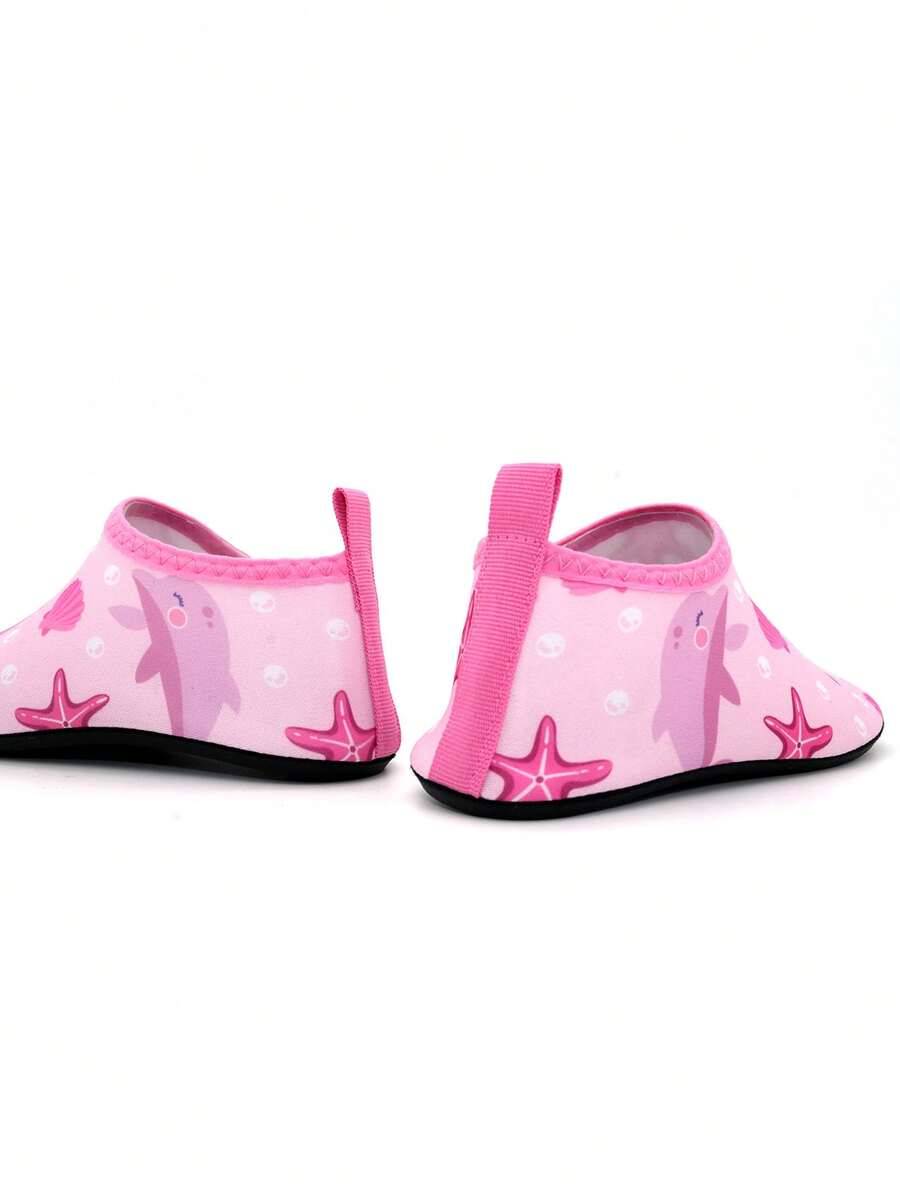 Boys breathable slip-on aqua water shoes featuring contrast binding and non-slip TPR soles for beach and outdoor activities.