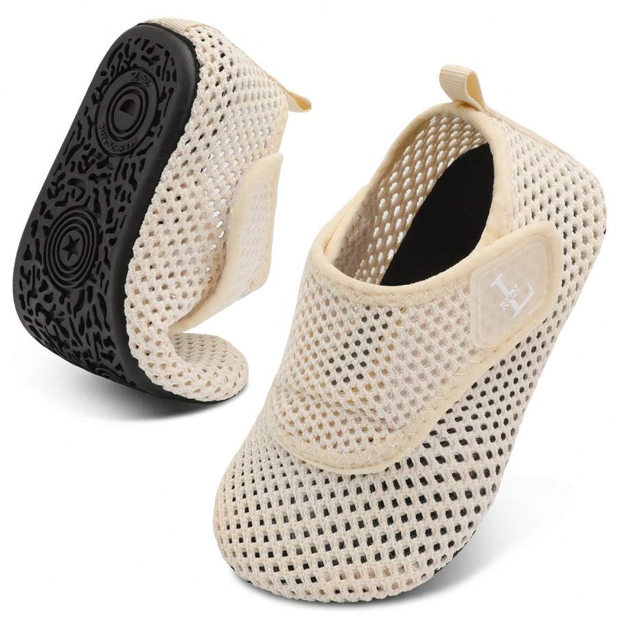 Beige kids aquatic shoes featuring a breathable fabric upper, adjustable hook and loop strap closure, and a flexible non-slip rubber outsole.