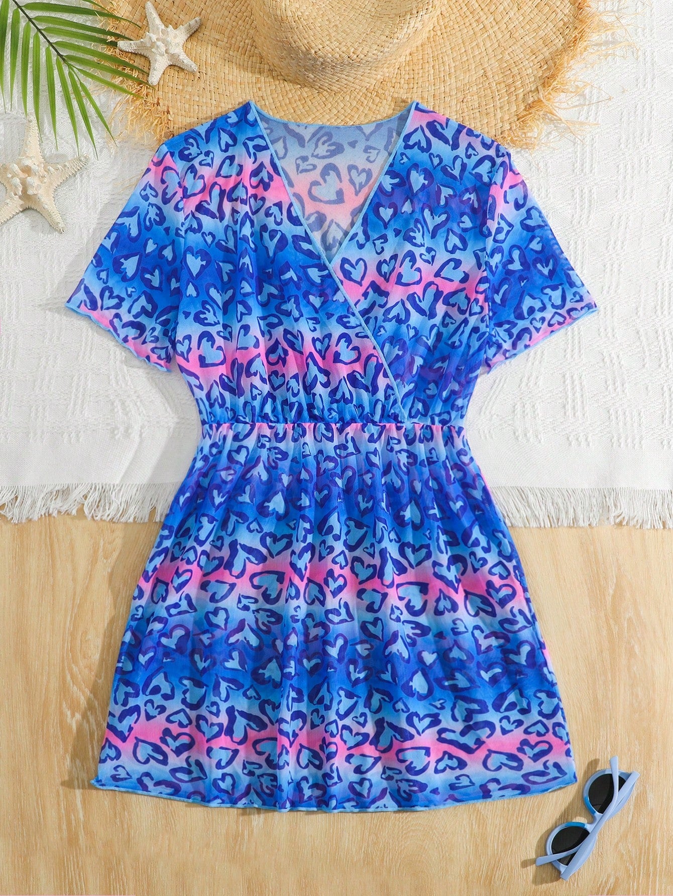 Multicolor heart print long cover up dress for tween girls featuring a V-neck criss-cross wrap front and short sleeves.