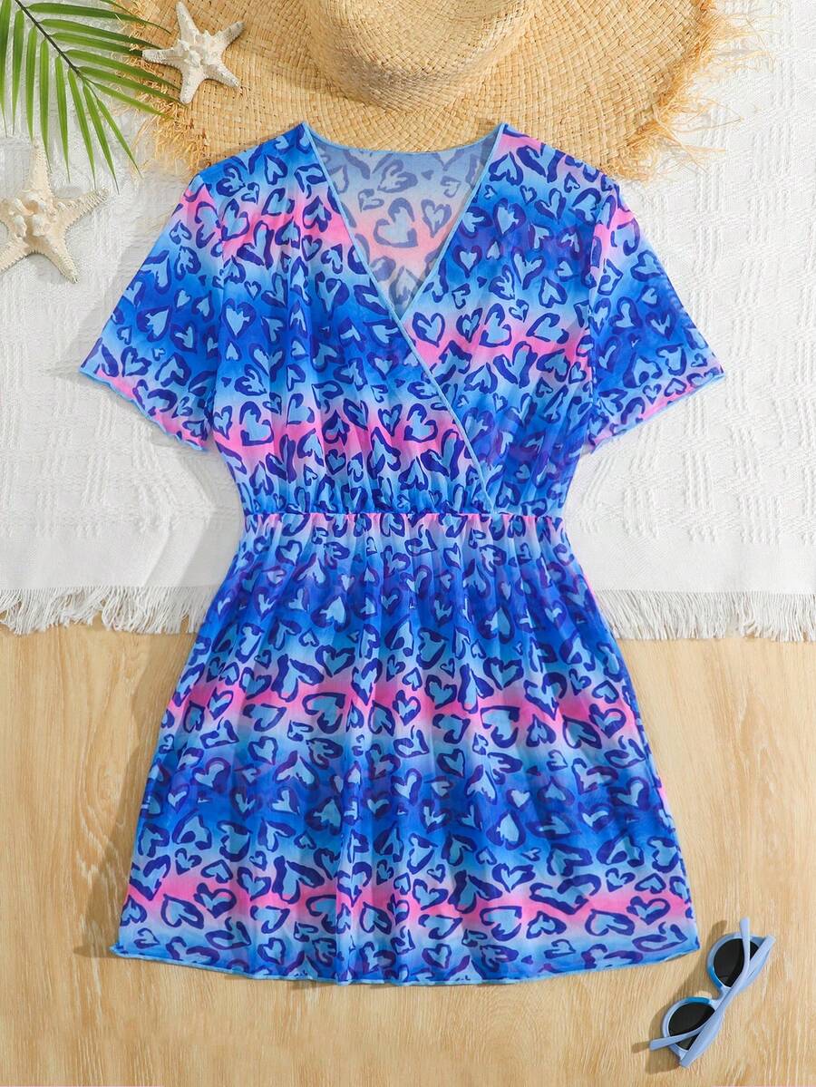 Multicolor heart print long cover up dress for tween girls featuring a V-neck criss-cross wrap front and short sleeves.