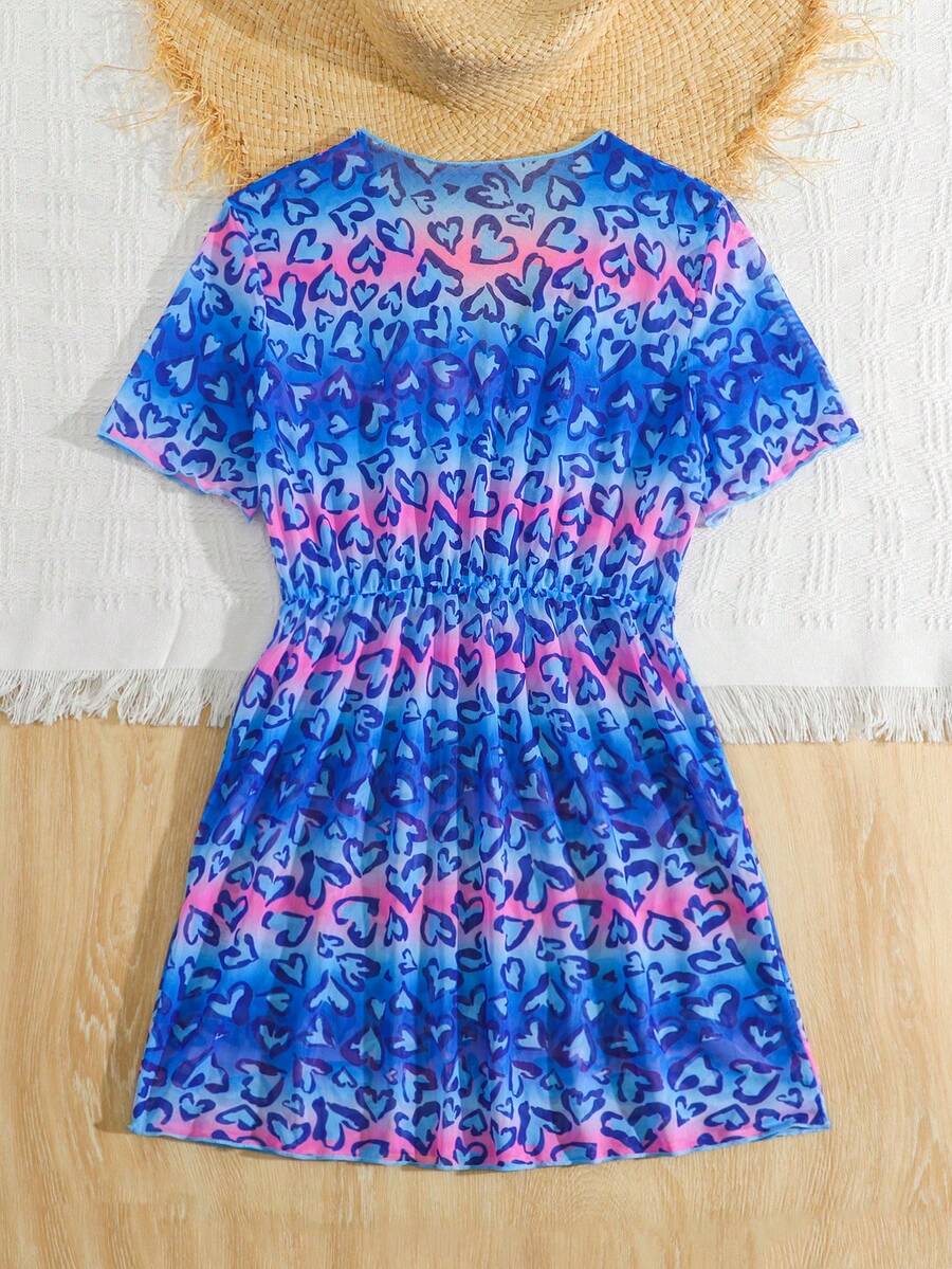 Multicolor heart print long cover up dress for tween girls featuring a V-neck criss-cross wrap front and short sleeves.
