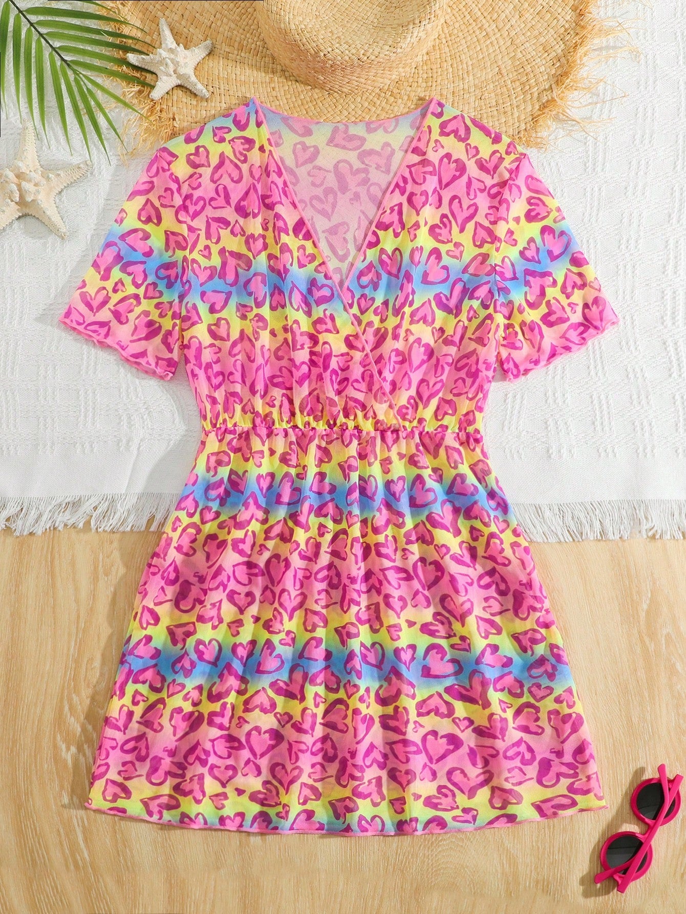 Multicolor heart print long cover up dress for tween girls featuring a V-neck criss-cross wrap front and short sleeves.