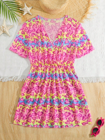 Multicolor heart print long cover up dress for tween girls featuring a V-neck criss-cross wrap front and short sleeves.