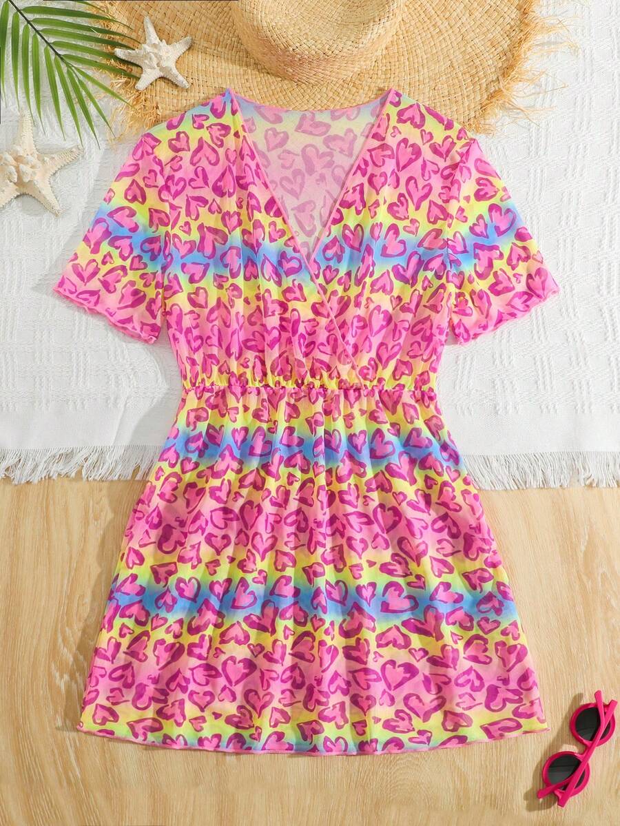 Multicolor heart print long cover up dress for tween girls featuring a V-neck criss-cross wrap front and short sleeves.