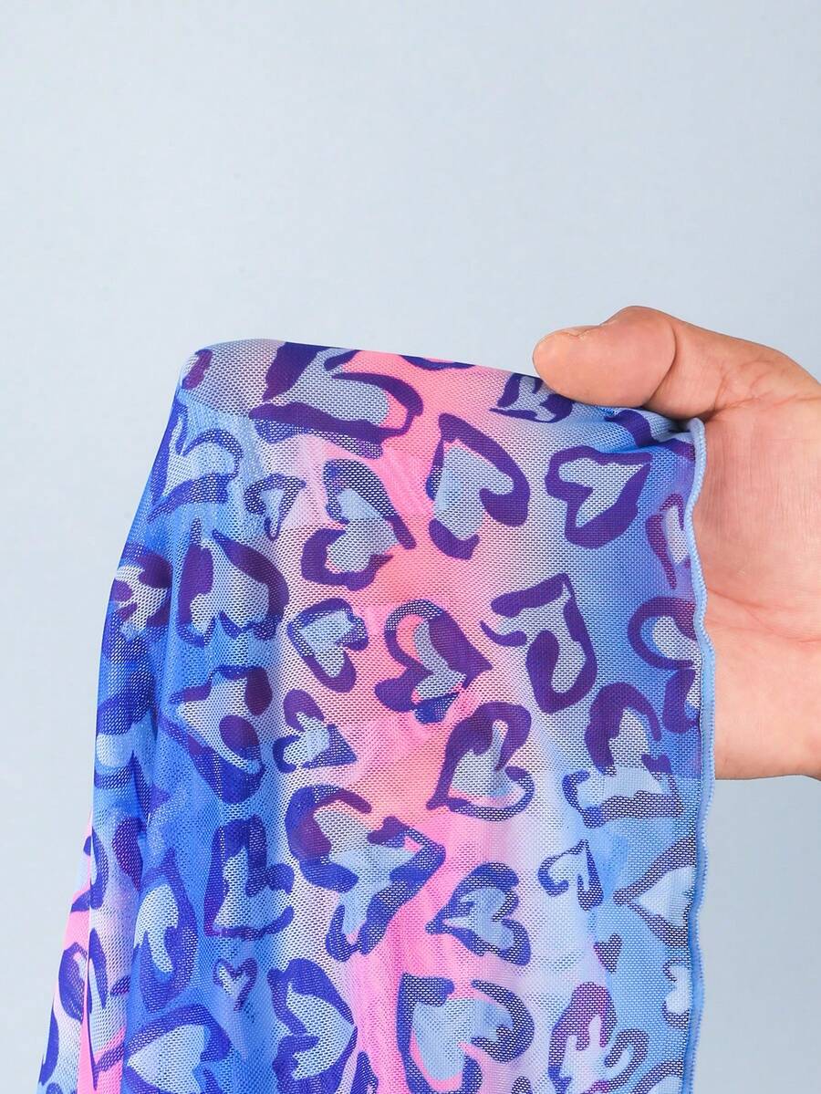 Multicolor heart print long cover up dress for tween girls featuring a V-neck criss-cross wrap front and short sleeves.