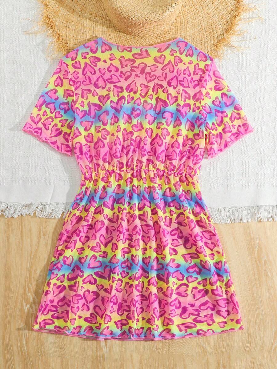 Multicolor heart print long cover up dress for tween girls featuring a V-neck criss-cross wrap front and short sleeves.