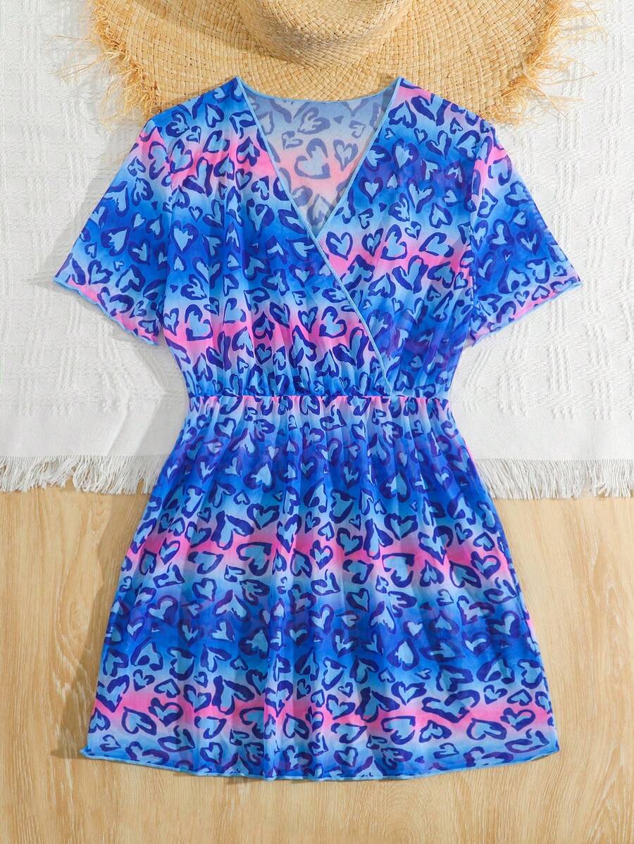 Multicolor heart print long cover up dress for tween girls featuring a V-neck criss-cross wrap front and short sleeves.