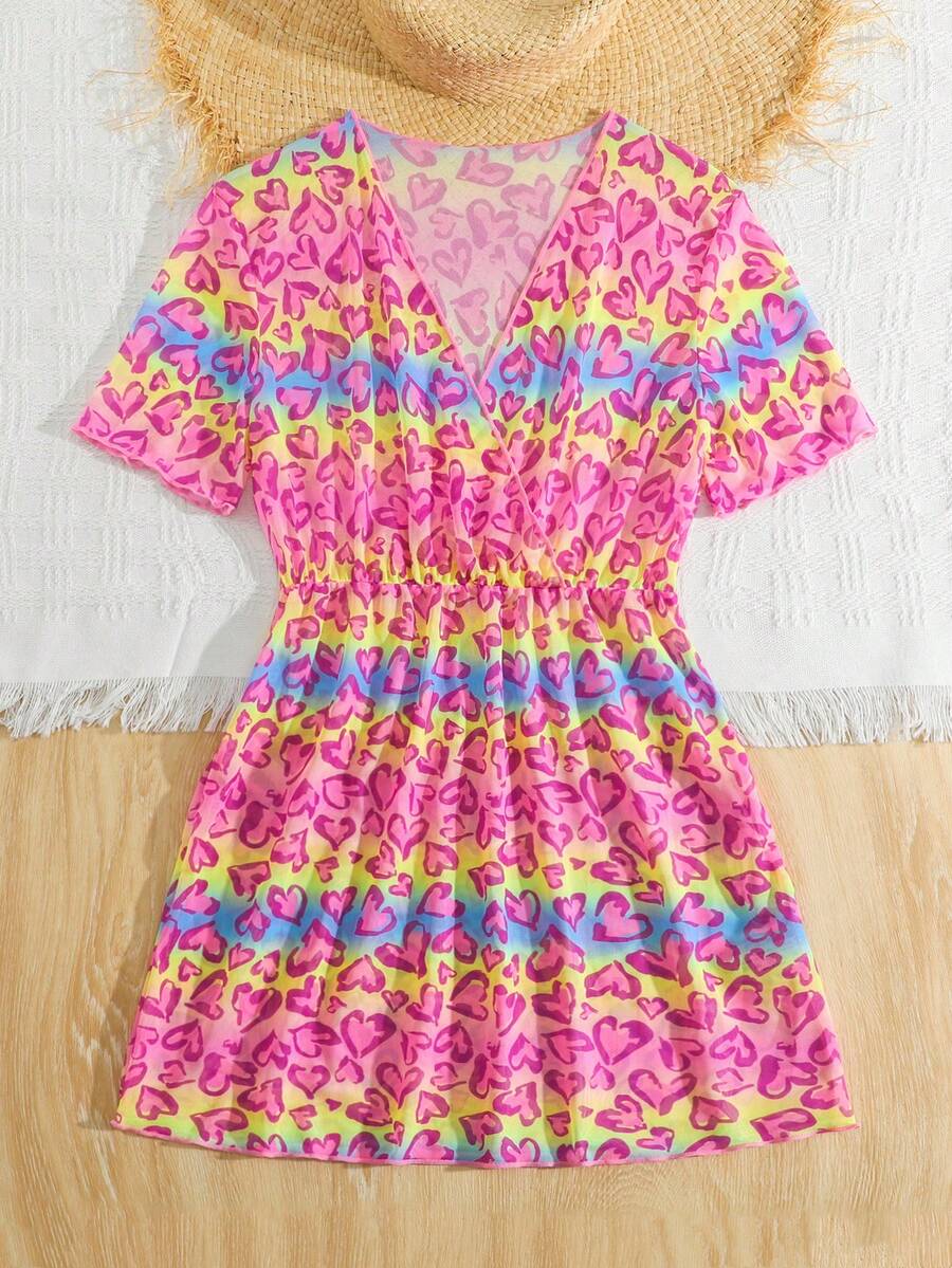Multicolor heart print long cover up dress for tween girls featuring a V-neck criss-cross wrap front and short sleeves.