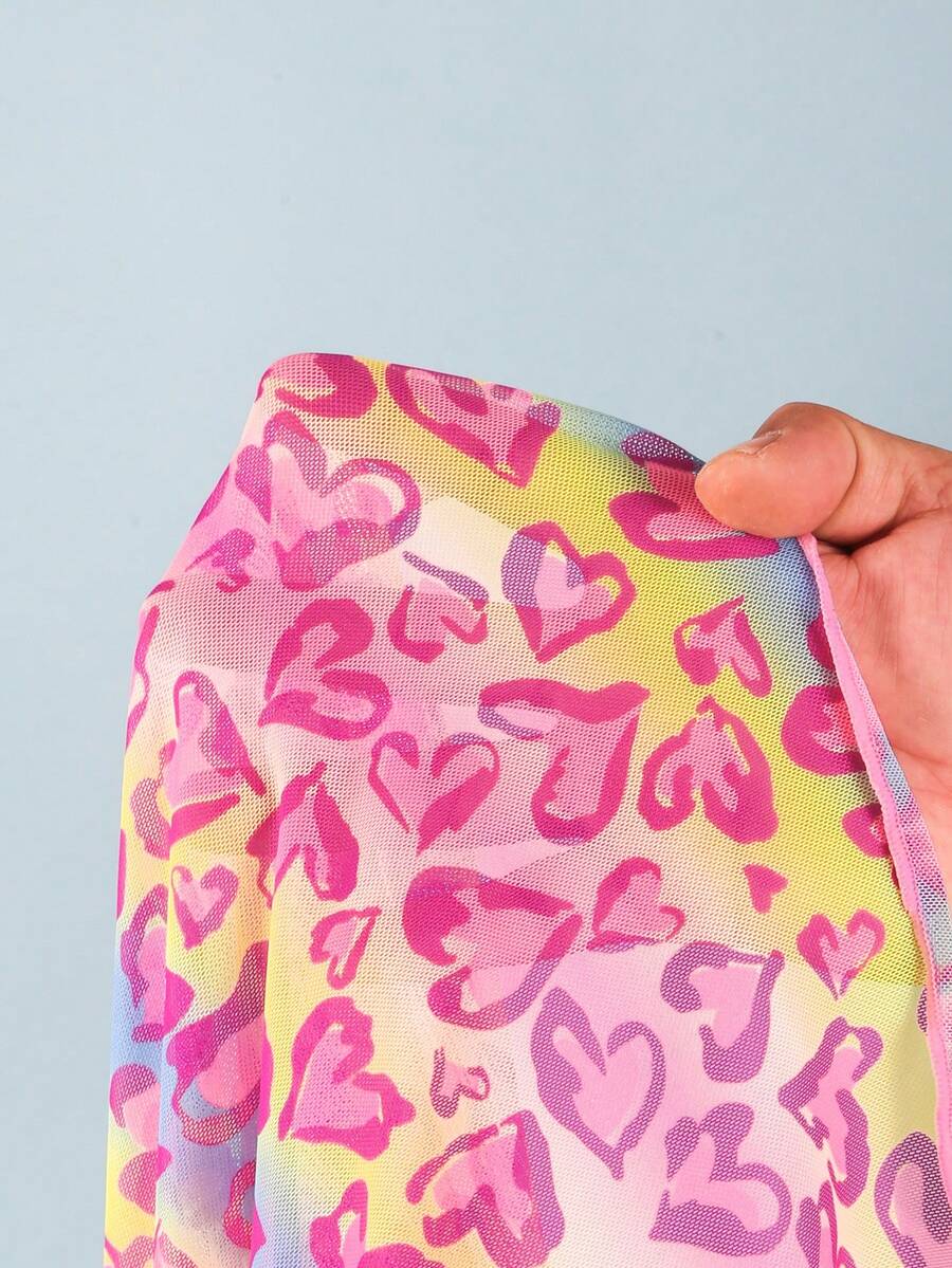 Multicolor heart print long cover up dress for tween girls featuring a V-neck criss-cross wrap front and short sleeves.