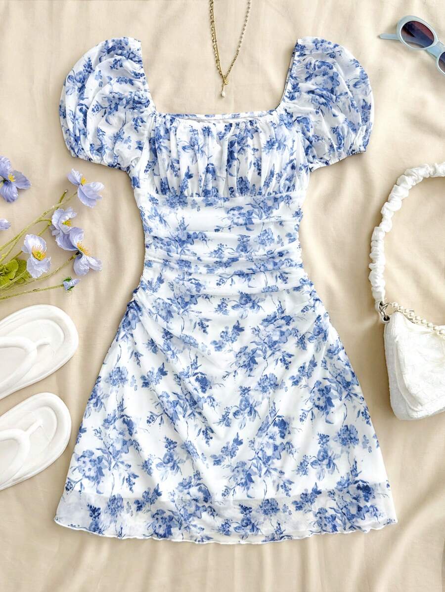 Teen girls red floral print A-line party dress featuring short puff sleeves, square neckline, ruched bust, and contrast lace details.