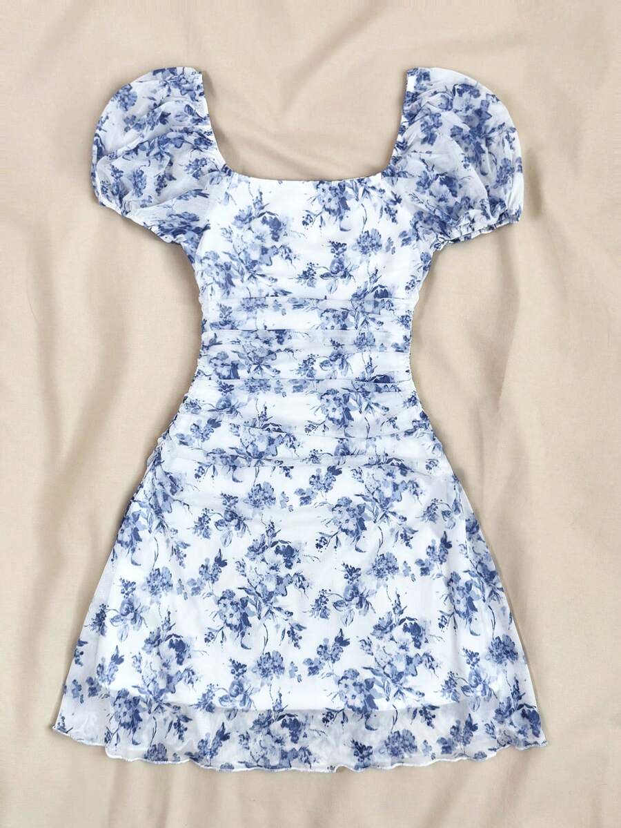 Teen girls red floral print A-line party dress featuring short puff sleeves, square neckline, ruched bust, and contrast lace details.