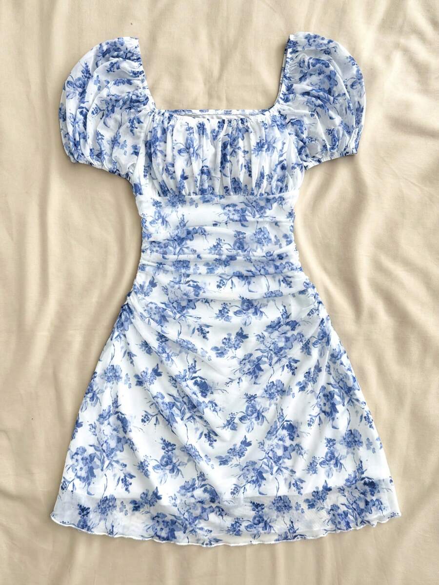 Teen girls red floral print A-line party dress featuring short puff sleeves, square neckline, ruched bust, and contrast lace details.