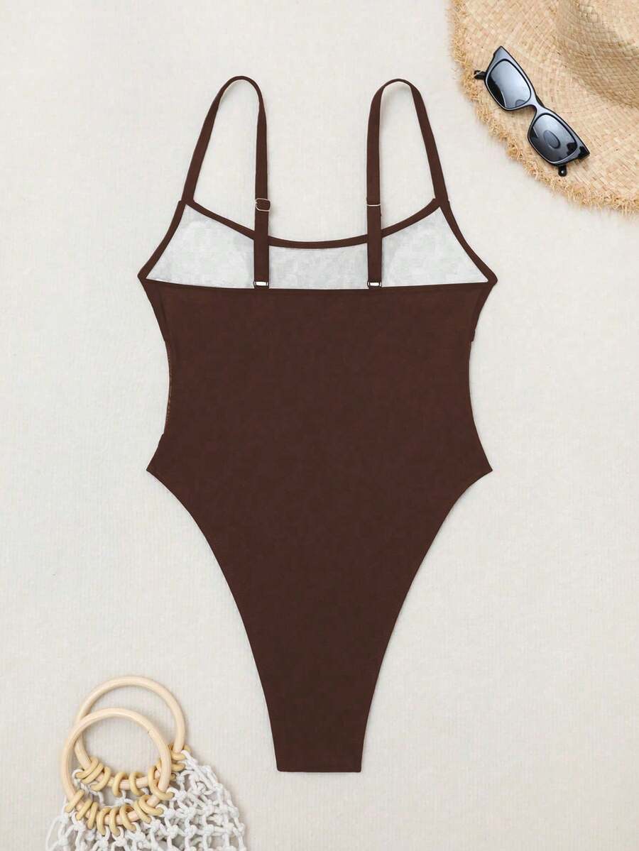 Black floral print mesh patchwork one-piece swimsuit for women featuring spaghetti straps, V-wired triangle cups, and a high waist silhouette.