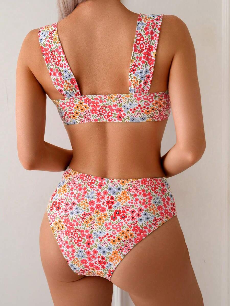 Springbreak black high waist bikini set for women featuring wireless bra top with ruffle lettuce trim and V-wired detail.