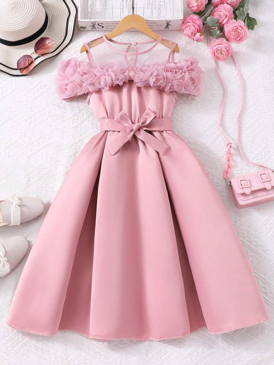 Tween girls dusty blue casual A-line dress with round neck, ruffle accents, high waist, and flared hem.