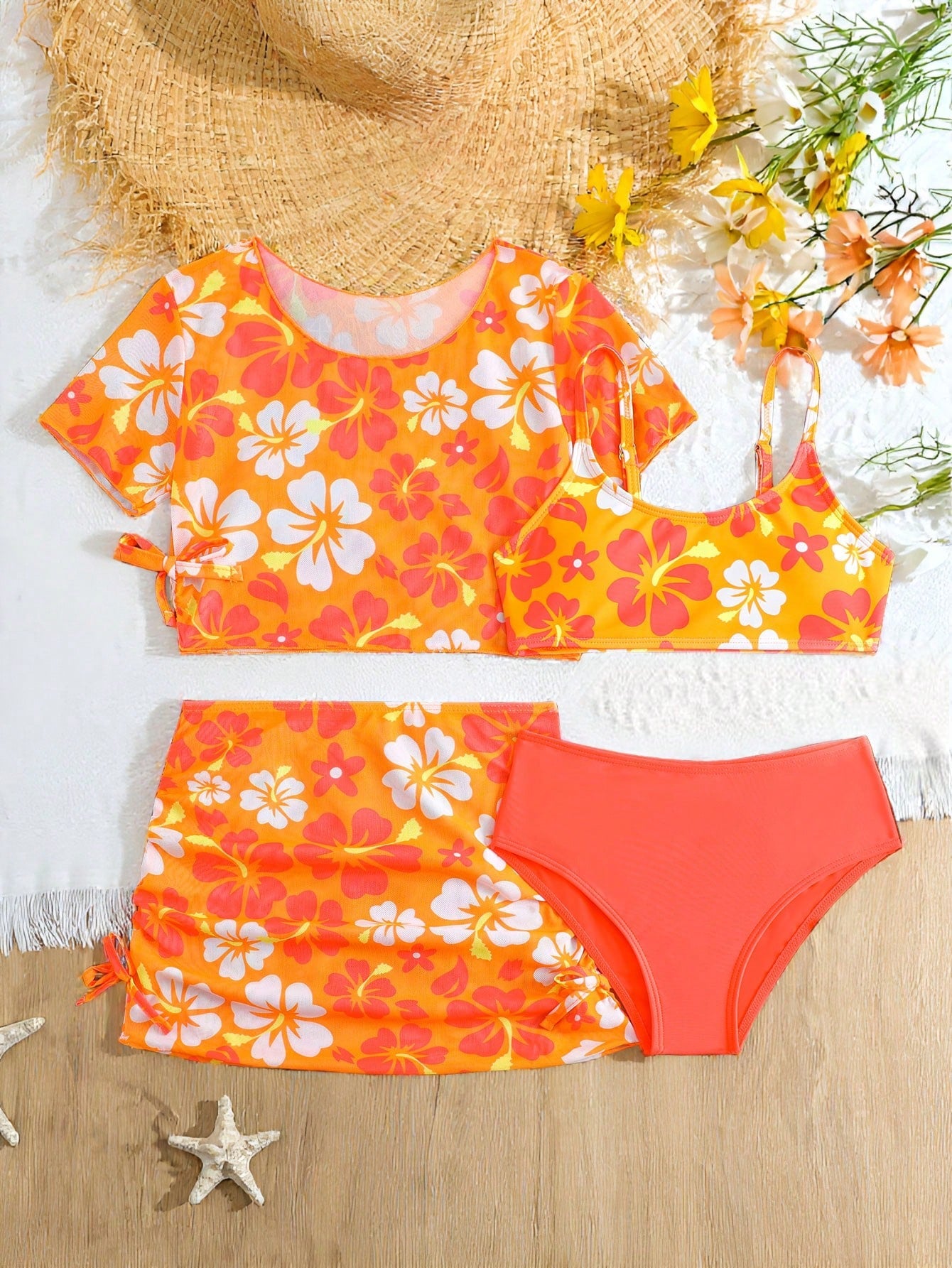 Tween girls 4-piece boho butterfly print bikini set in blue featuring spaghetti strap top, mid waist bottoms, and matching cover-up skirt.