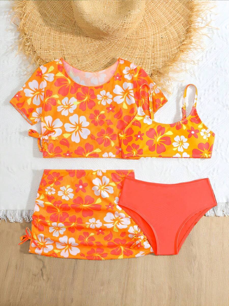 Tween girls 4-piece boho butterfly print bikini set in blue featuring spaghetti strap top, mid waist bottoms, and matching cover-up skirt.