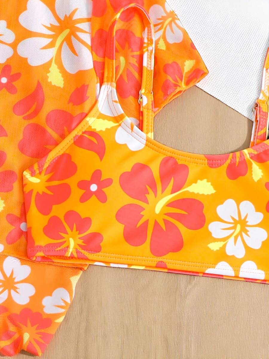 Tween girls 4-piece boho butterfly print bikini set in blue featuring spaghetti strap top, mid waist bottoms, and matching cover-up skirt.