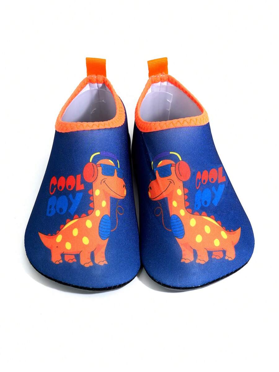 Multicolor cartoon dinosaur kids water shoes with breathable slip-on design and non-slip rubber outsole for boys.