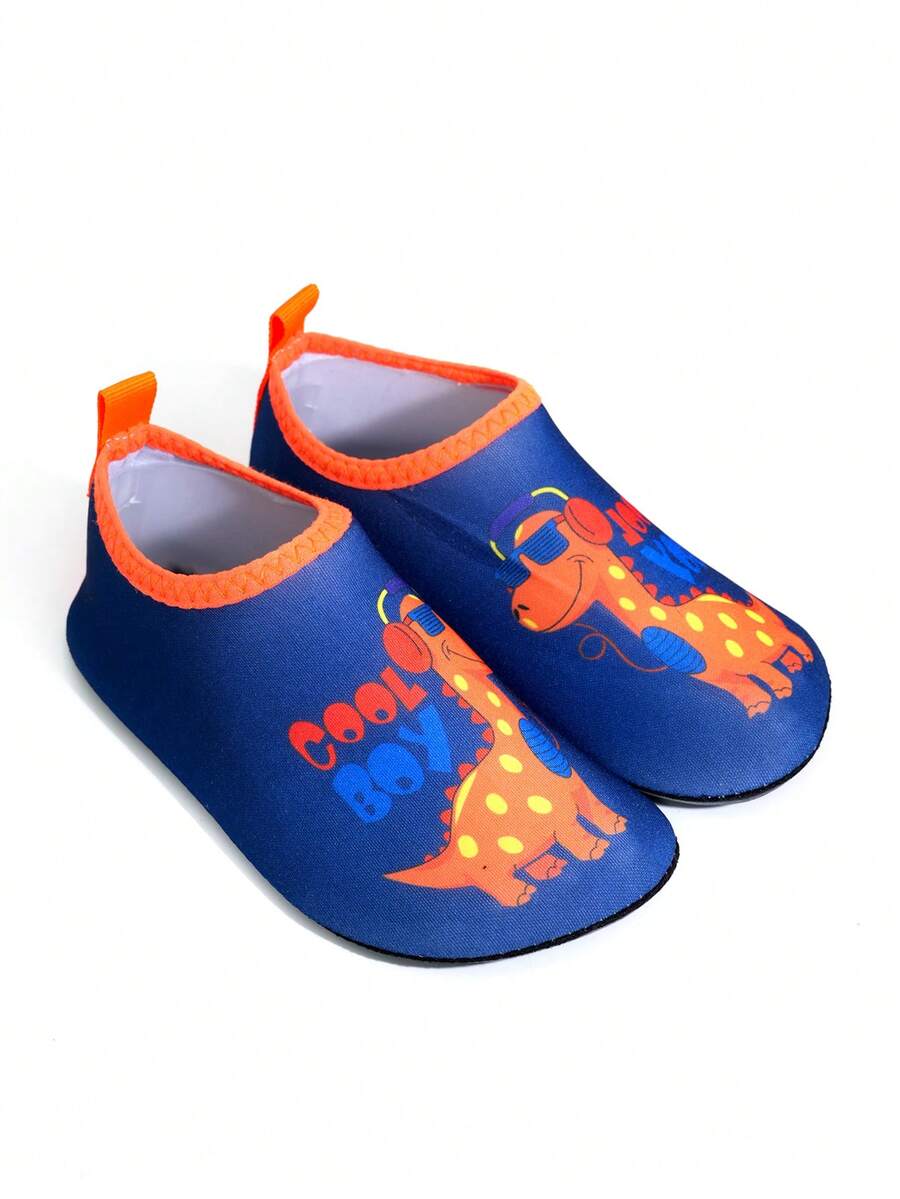 Multicolor cartoon dinosaur kids water shoes with breathable slip-on design and non-slip rubber outsole for boys.