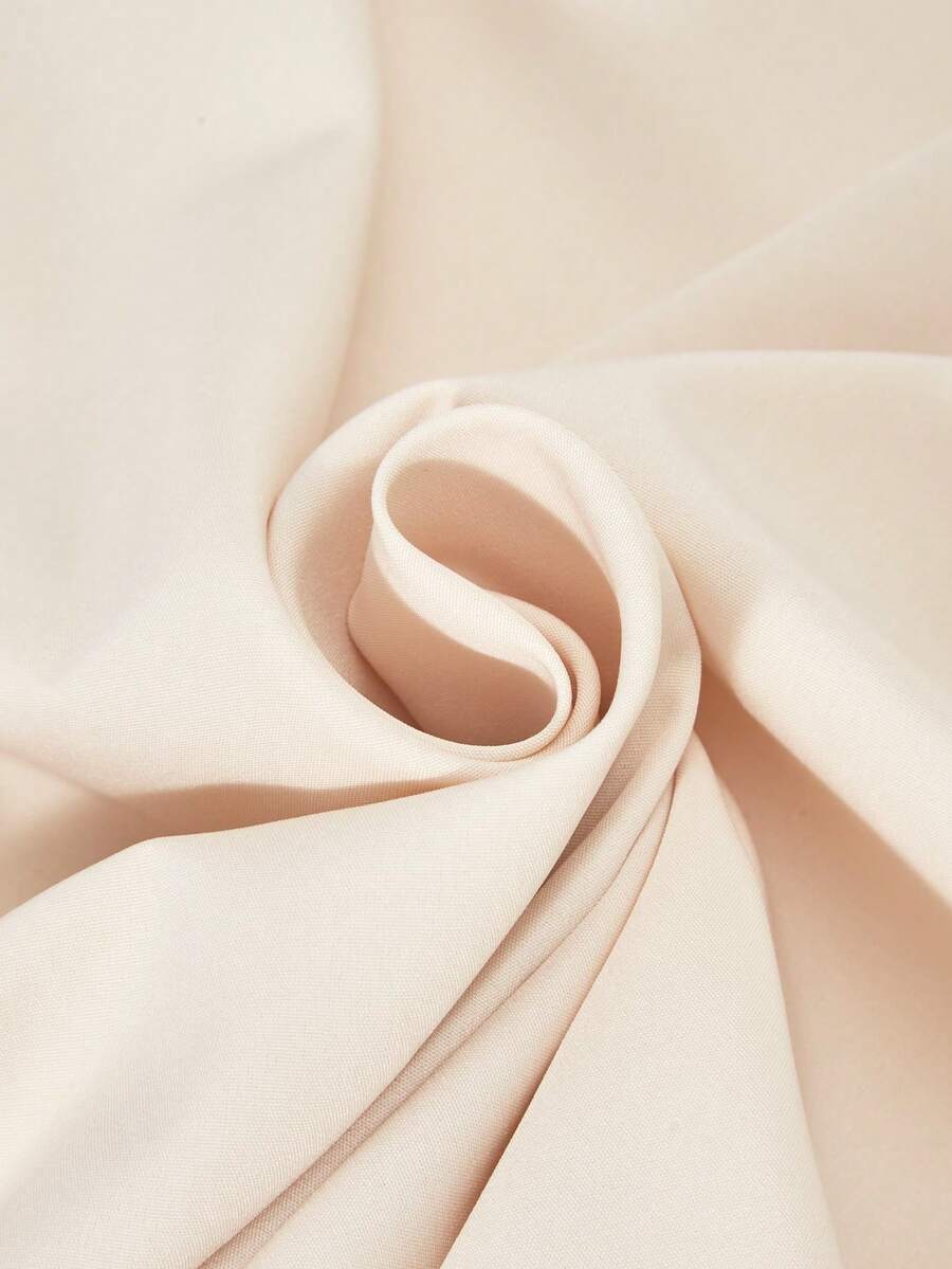 Apricot tween girls dress featuring square neckline, short puff sleeves, ruched bust, high waist, and flared A-line hem.