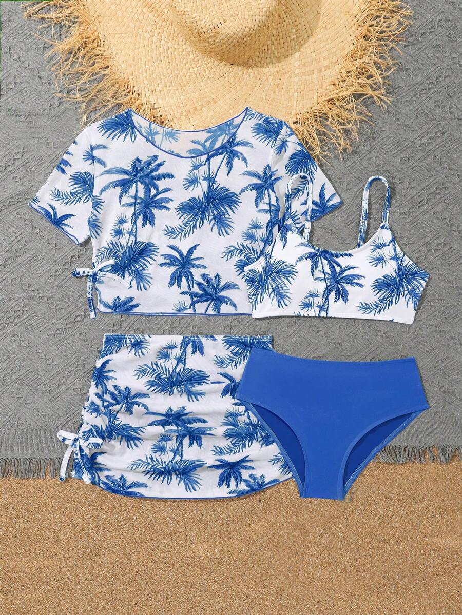 Tween girls 4-piece boho butterfly print bikini set in blue featuring spaghetti strap top, mid waist bottoms, and matching cover-up skirt.