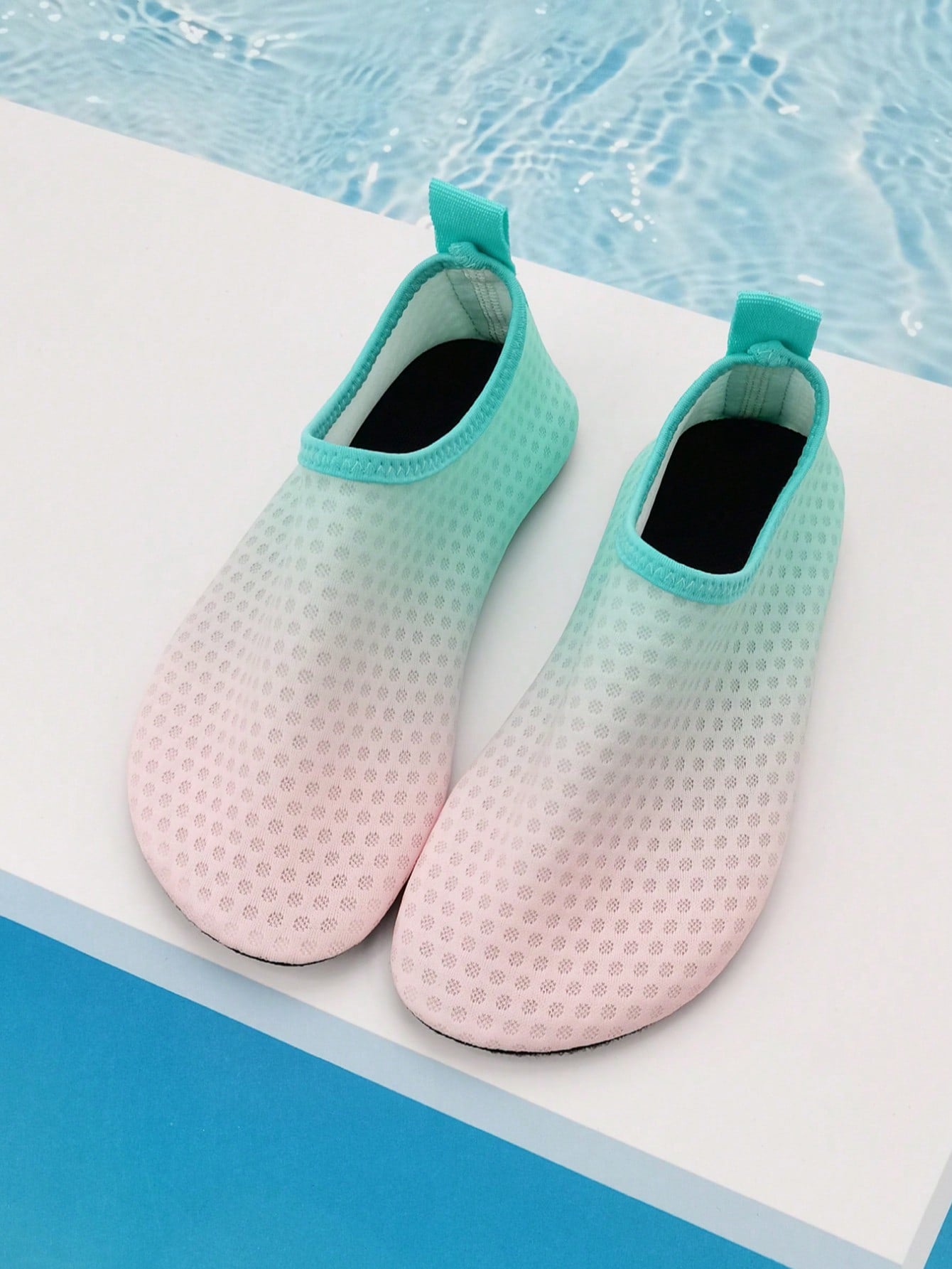 Gradient blue kids water shoes featuring breathable fabric upper, contrast binding, and flexible TPR outsole for outdoor and beach activities.