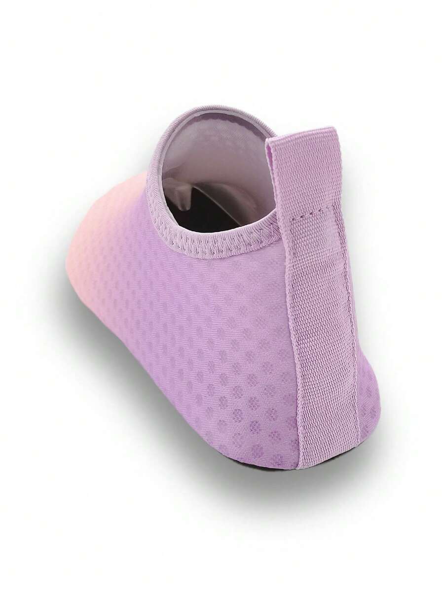 Gradient blue kids water shoes featuring breathable fabric upper, contrast binding, and flexible TPR outsole for outdoor and beach activities.