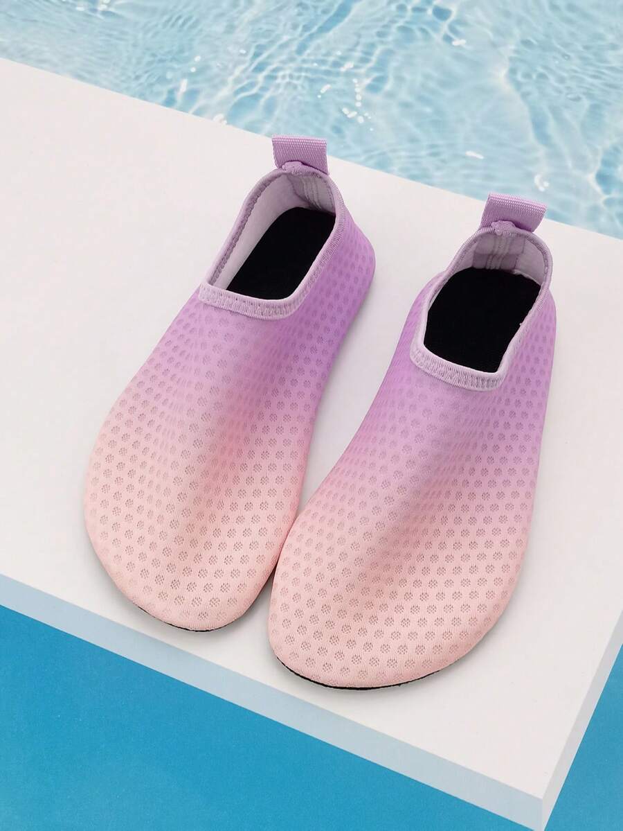 Gradient blue kids water shoes featuring breathable fabric upper, contrast binding, and flexible TPR outsole for outdoor and beach activities.
