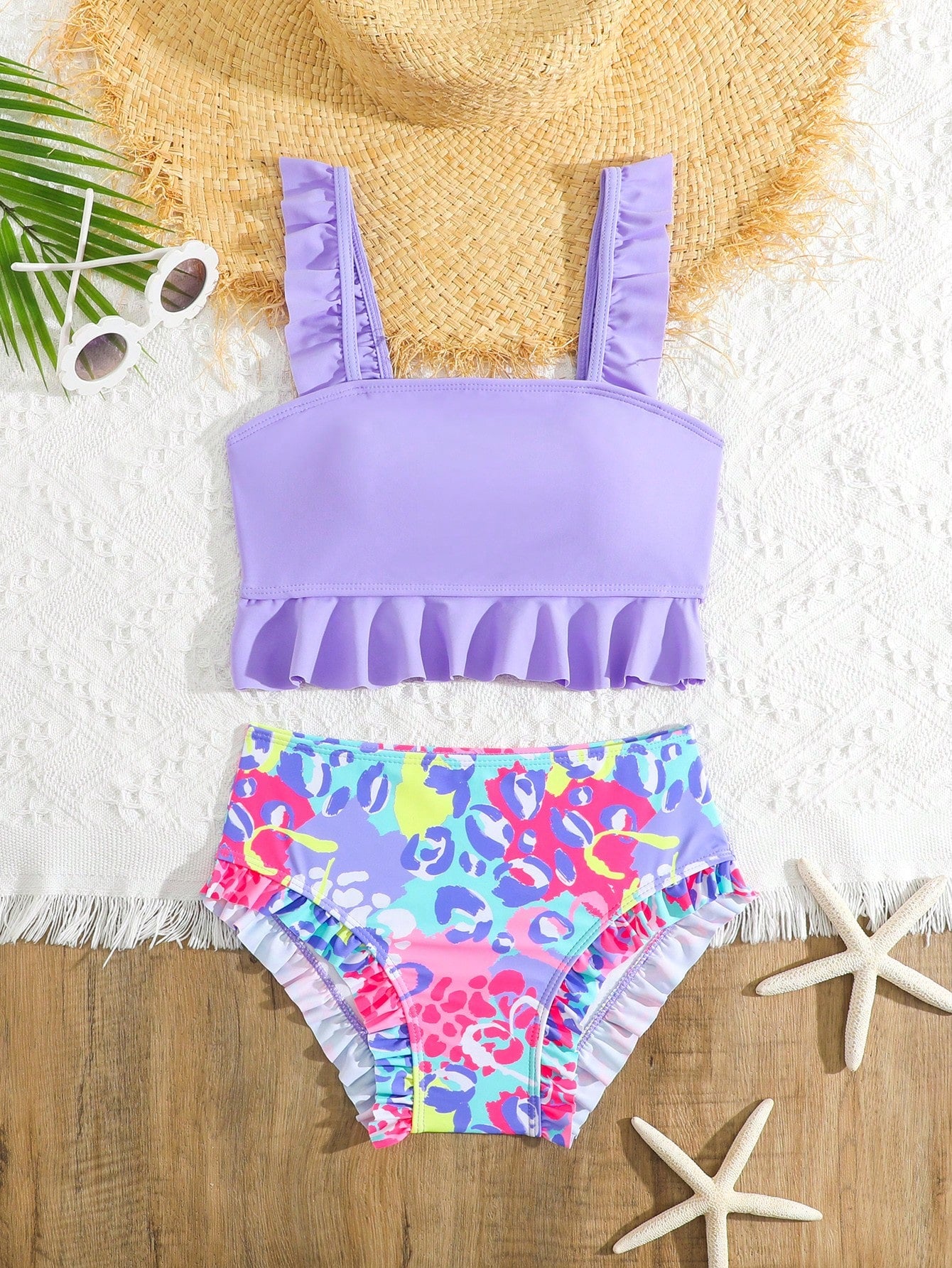 Tween girls solid color 2-piece bikini swimwear set with ruffle detail, strap neckline, wireless bikini top, and triangle mid-waist bikini bottoms; textured pattern with lined bottoms and high-stretch fabric, suitable for summer vacation.