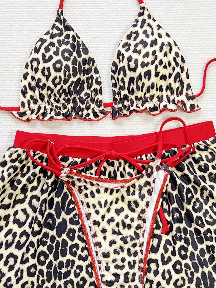 Women's 3-piece frill trim bikini set with halter tie-back top and high waist bottoms.