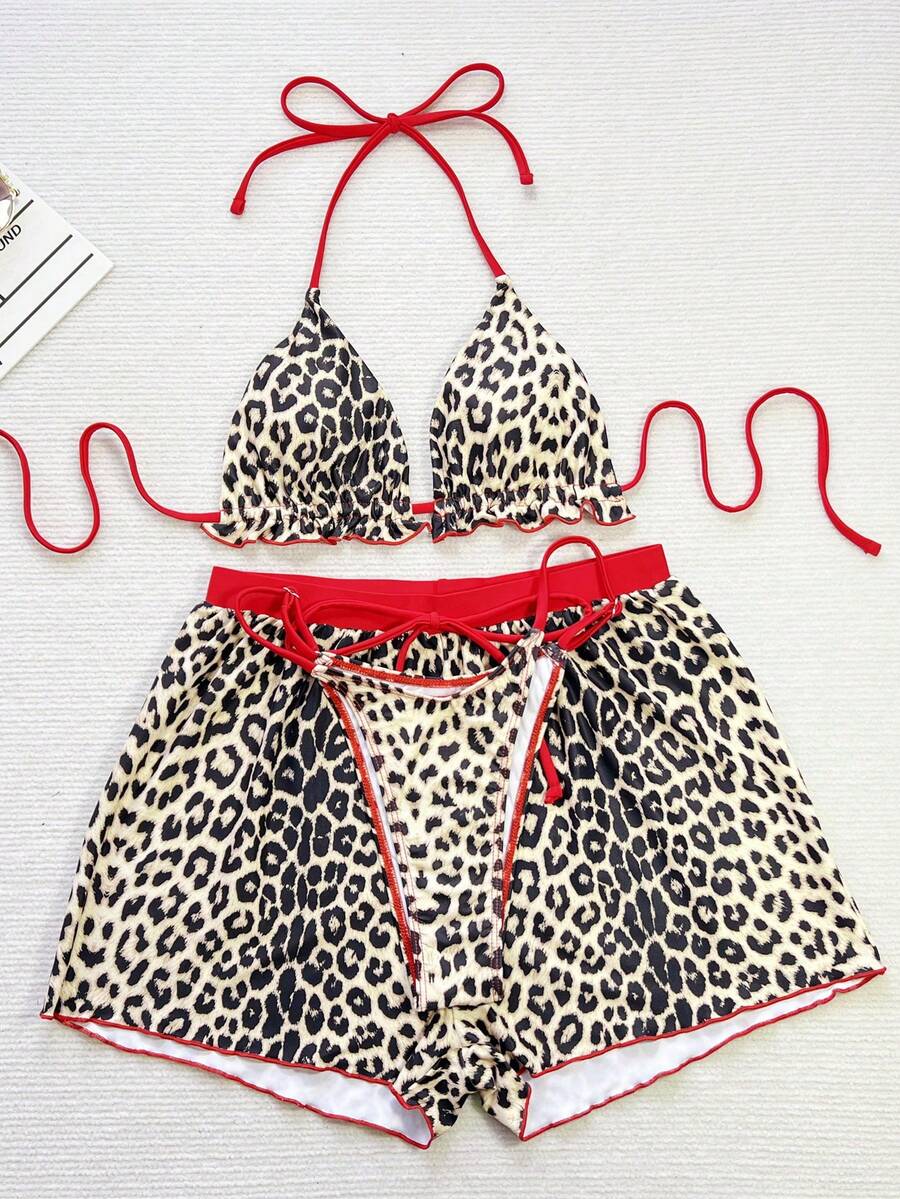 Women's 3-piece frill trim bikini set with halter tie-back top and high waist bottoms.