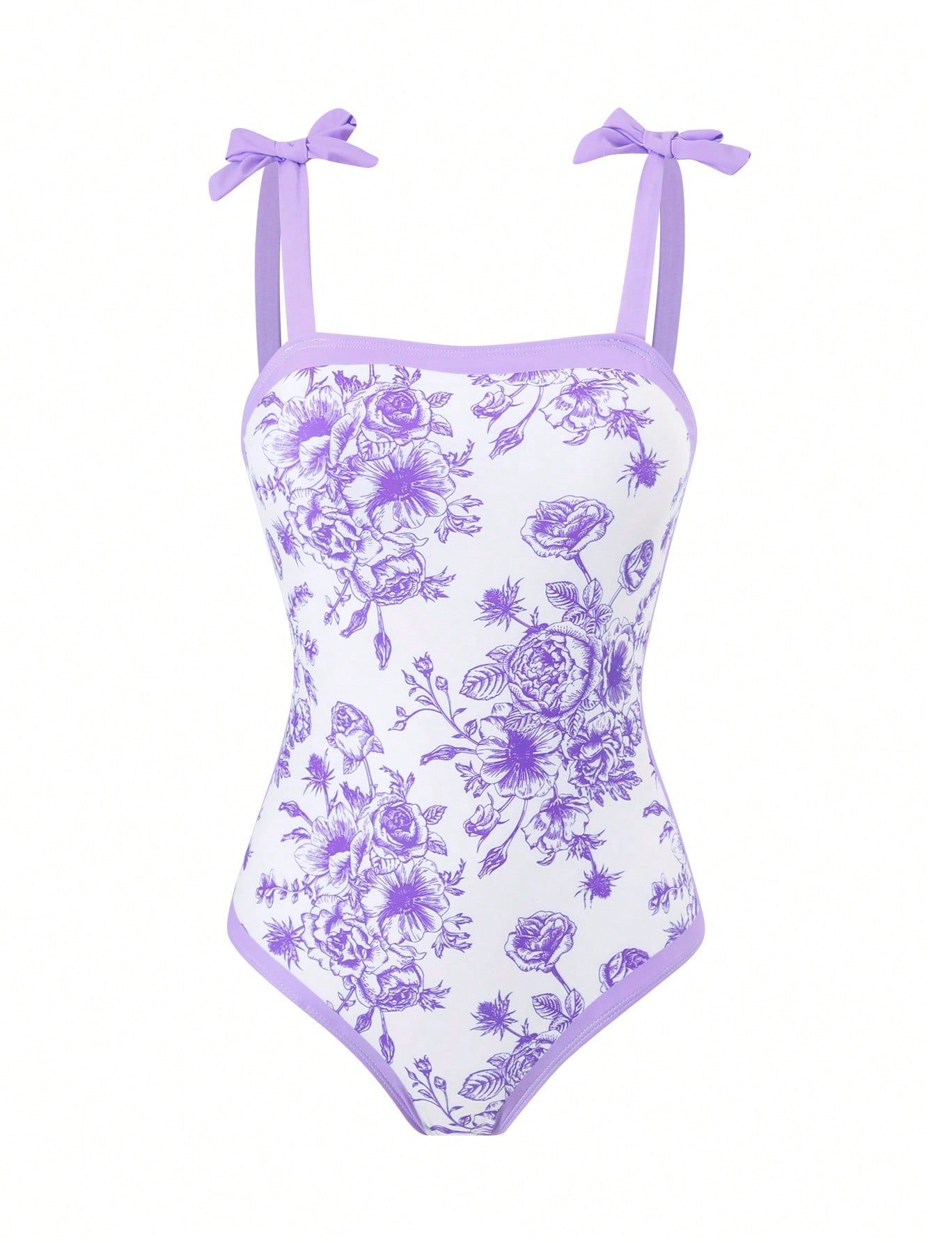 Tween girl black floral one-piece swimsuit set with spaghetti straps, asymmetrical detail, bow decor, and mid-waist bottom for beach, pool, and summer vacation wear.