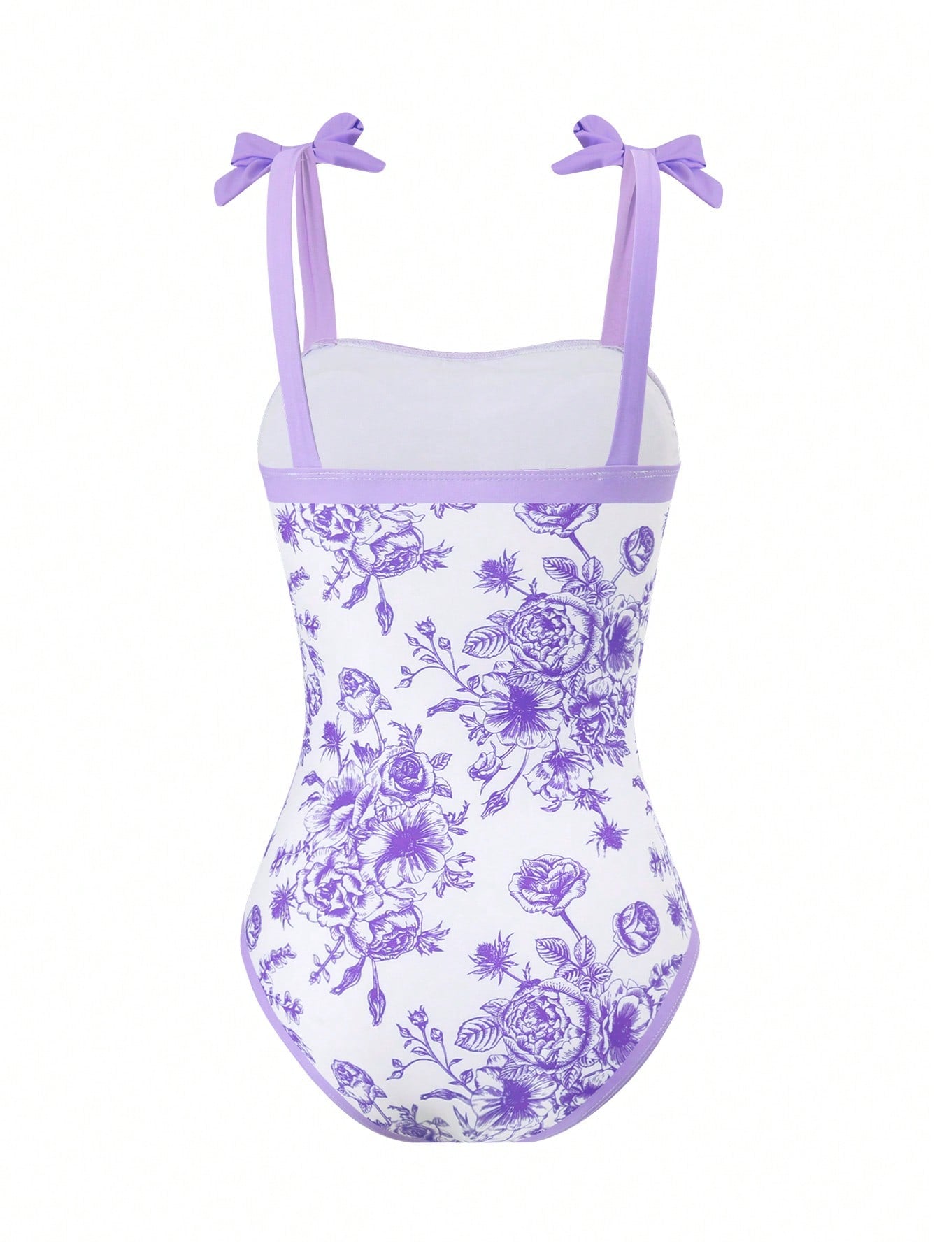 Tween girl black floral one-piece swimsuit set with spaghetti straps, asymmetrical detail, bow decor, and mid-waist bottom for beach, pool, and summer vacation wear.