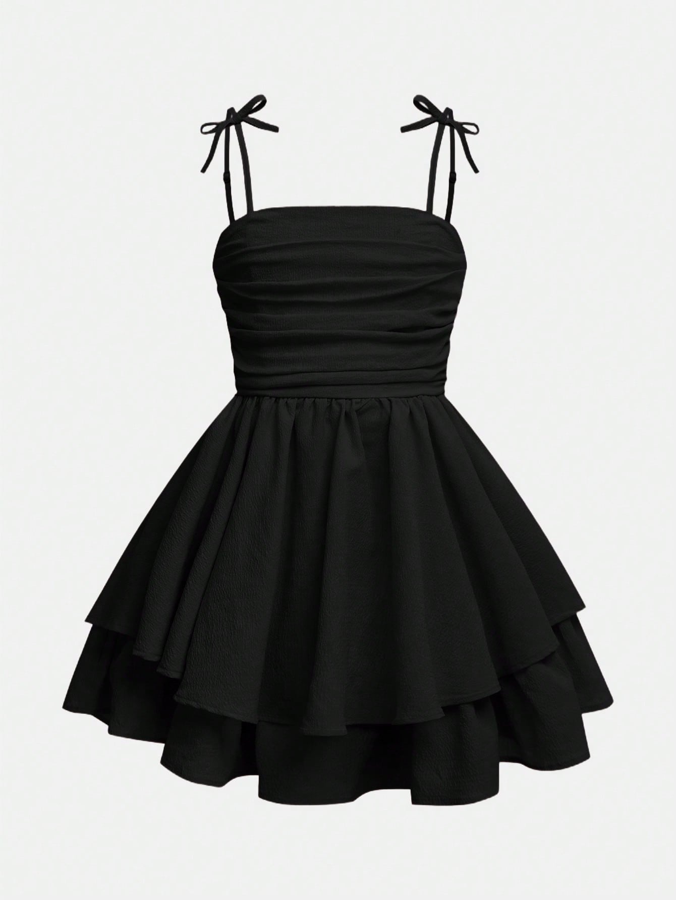 Tween girls apricot tiered cami dress with spaghetti straps, high waist, and slim fit layered hem.