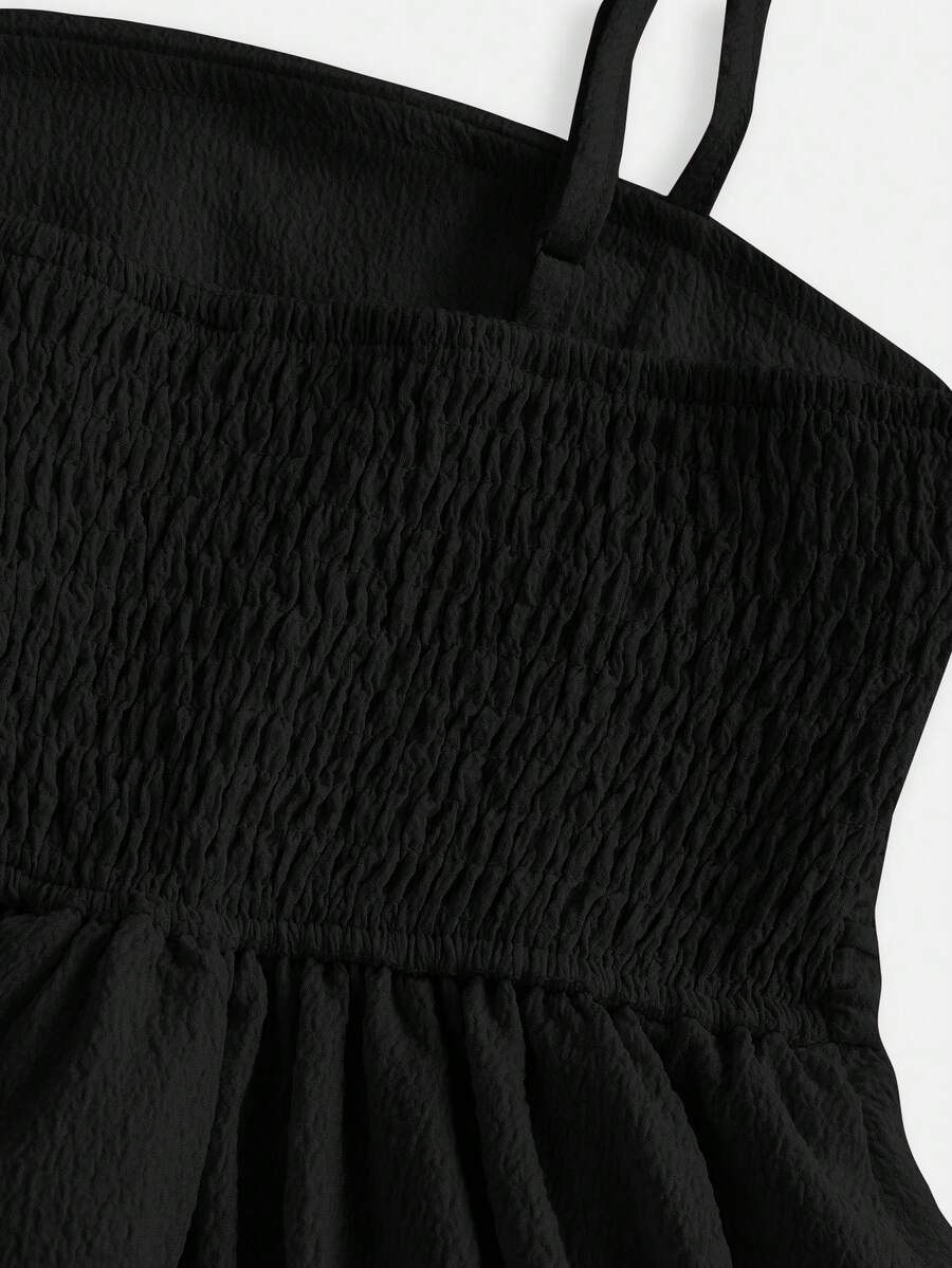 Tween girls apricot tiered cami dress with spaghetti straps, high waist, and slim fit layered hem.