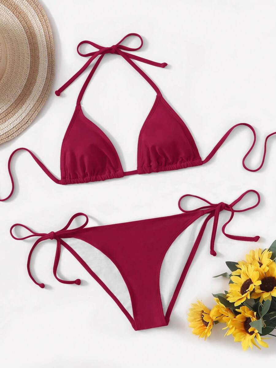Women's high waist halter tie bikini swimwear set featuring triangle cups, wireless bra with removable padding, and tie side bottoms.