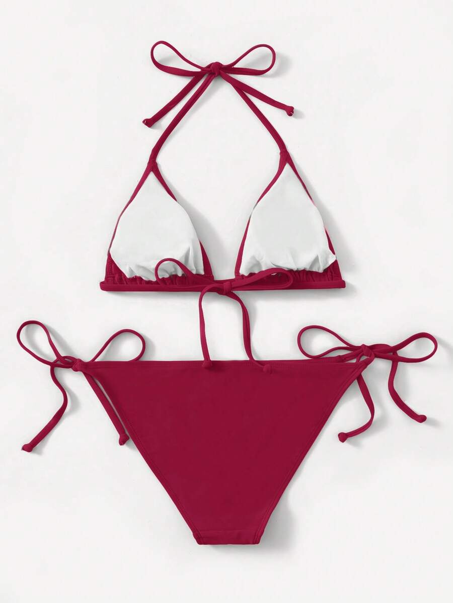 Women's high waist halter tie bikini swimwear set featuring triangle cups, wireless bra with removable padding, and tie side bottoms.