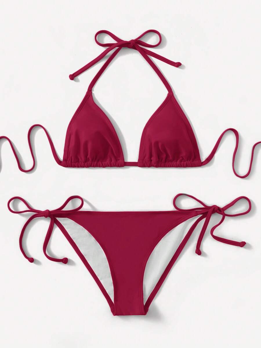 Women's high waist halter tie bikini swimwear set featuring triangle cups, wireless bra with removable padding, and tie side bottoms.