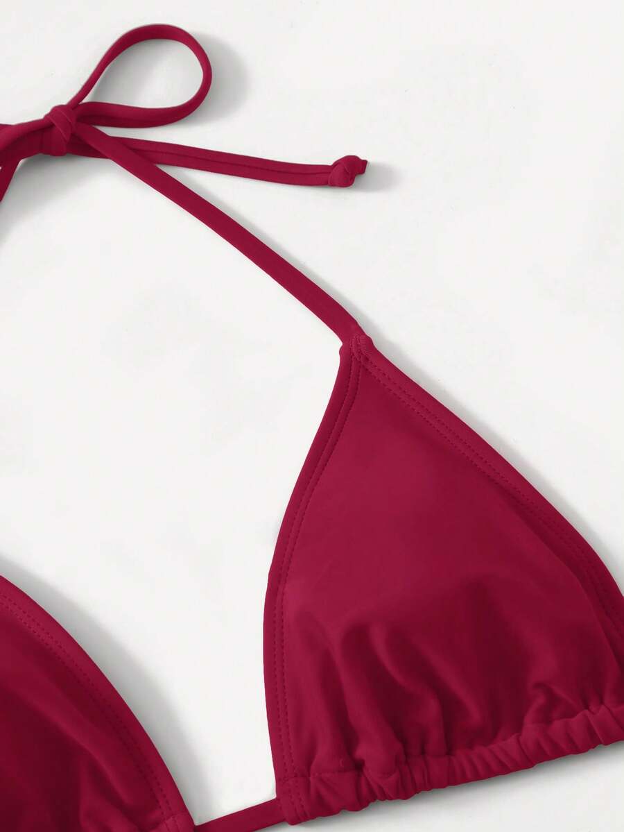Women's high waist halter tie bikini swimwear set featuring triangle cups, wireless bra with removable padding, and tie side bottoms.