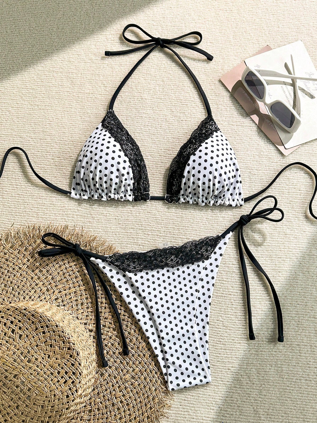 Women's 2-piece high-waist bikini swimsuit set featuring triangle cups and tie-side bottoms