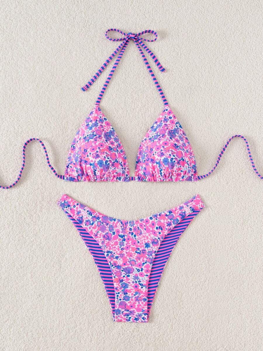 Women's two-piece halter bikini set featuring high cut thong bottoms and removable padding