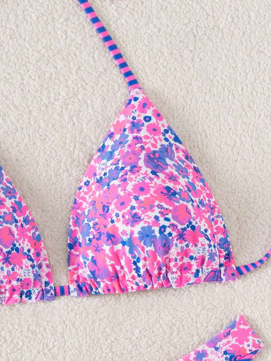 Women's two-piece halter bikini set featuring high cut thong bottoms and removable padding
