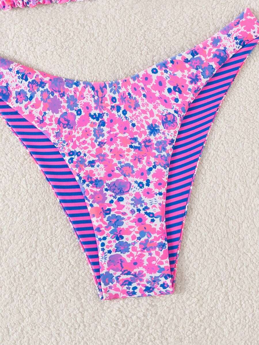 Women's two-piece halter bikini set featuring high cut thong bottoms and removable padding